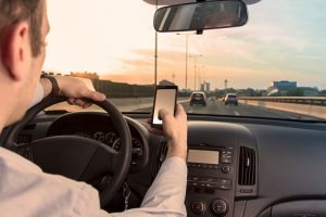 texting-behind-wheel